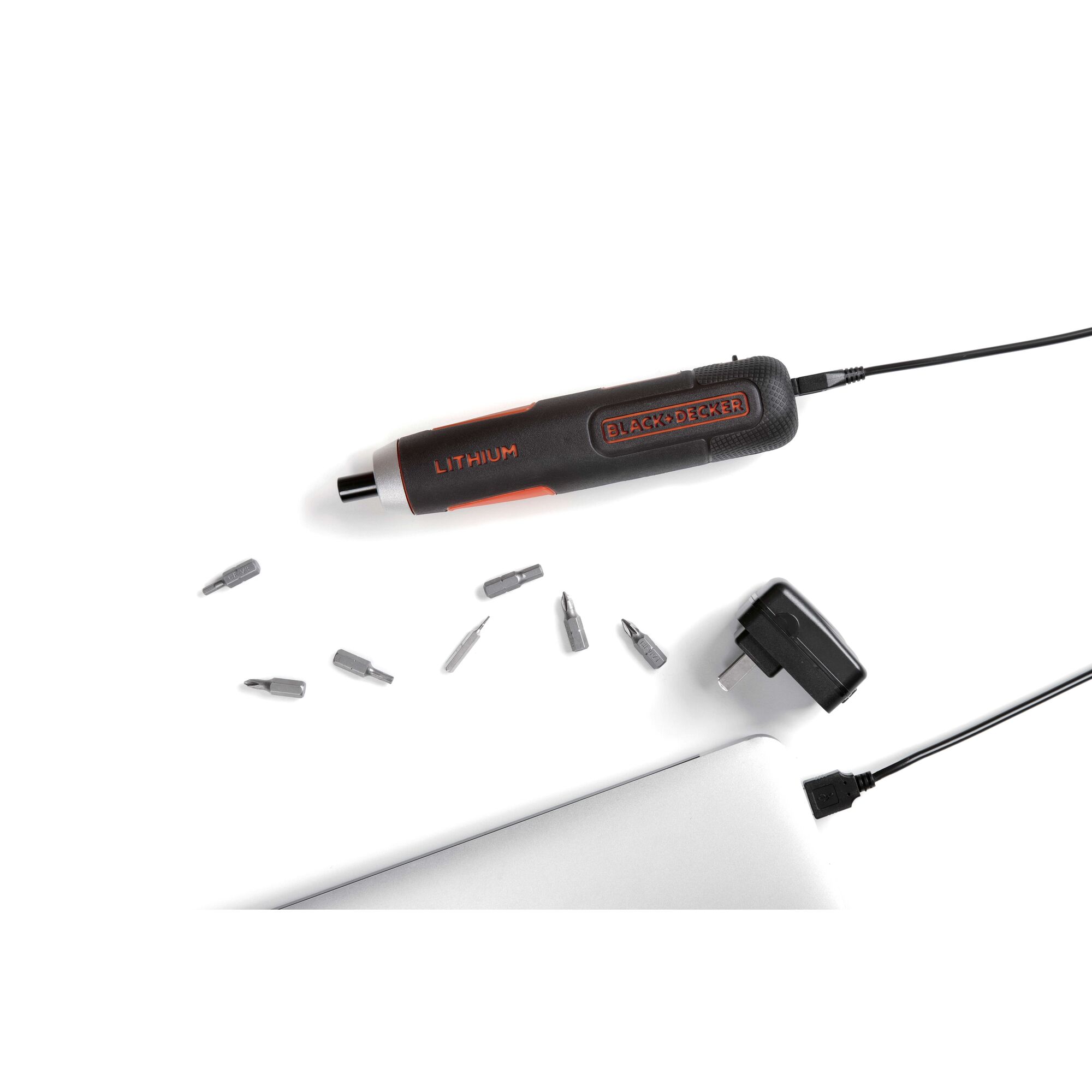A BLACK+DECKER lithium rechargeable screwdriver kit with multiple interchangeable bits and a charging adapter, displayed on a white surface.